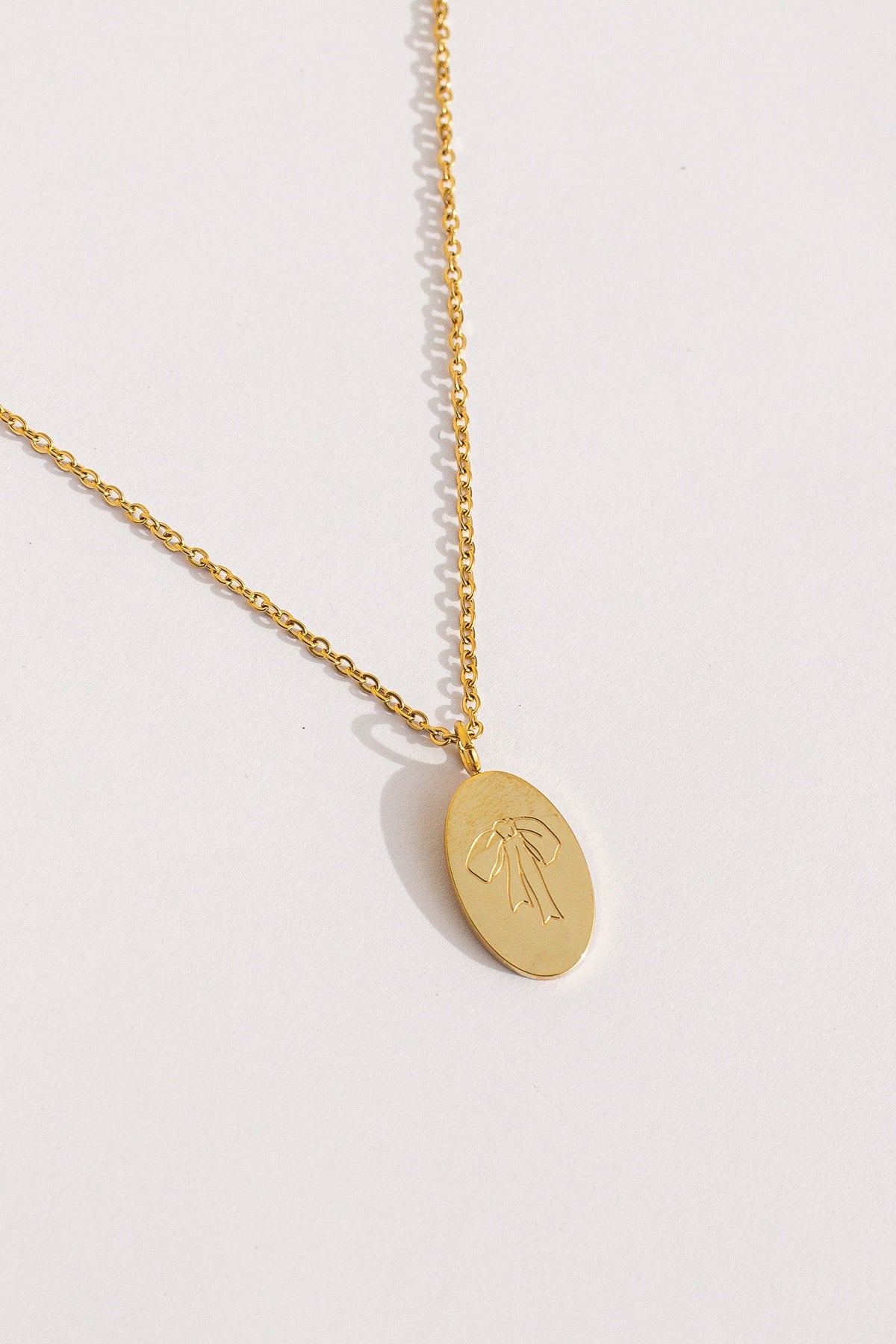 Bow Pendant Necklace by Rose & Clay