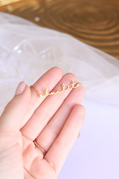 Rose & Clay "Abuelita" cursive script name necklace, gold or silver stainless steel
