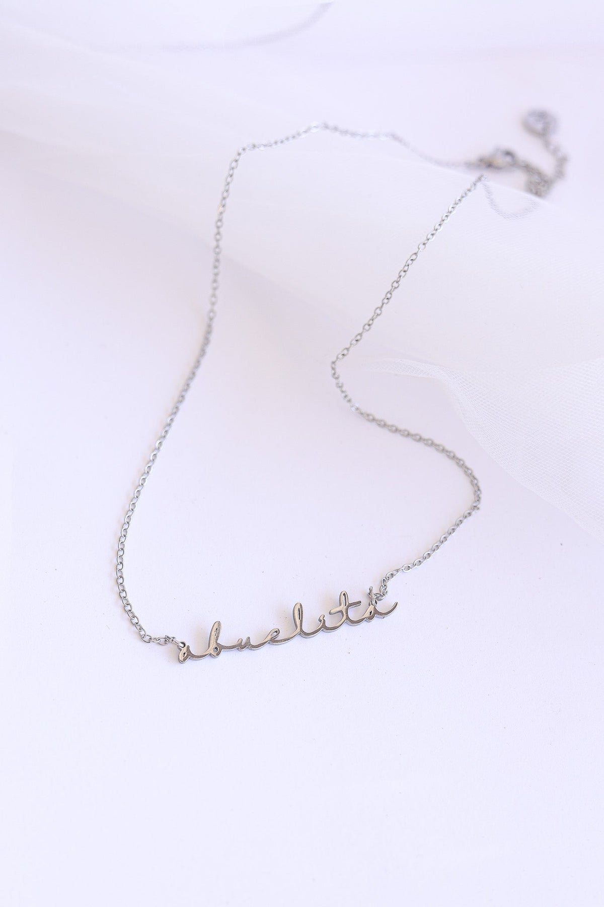 Rose & Clay "Abuelita" cursive script name necklace, gold or silver stainless steel