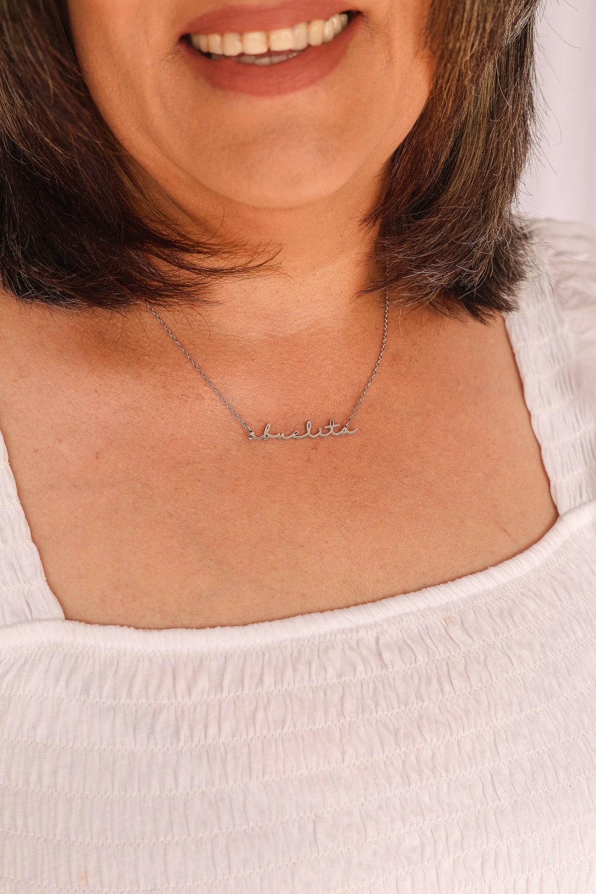 Rose & Clay "Abuelita" cursive script name necklace, gold or silver stainless steel