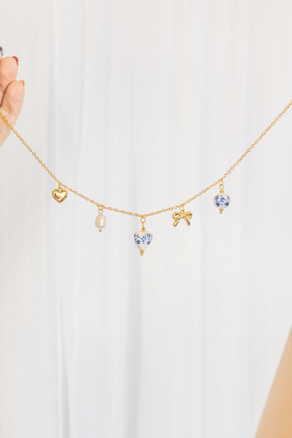 Bella Charm Necklace in Blue by Rose & Clay