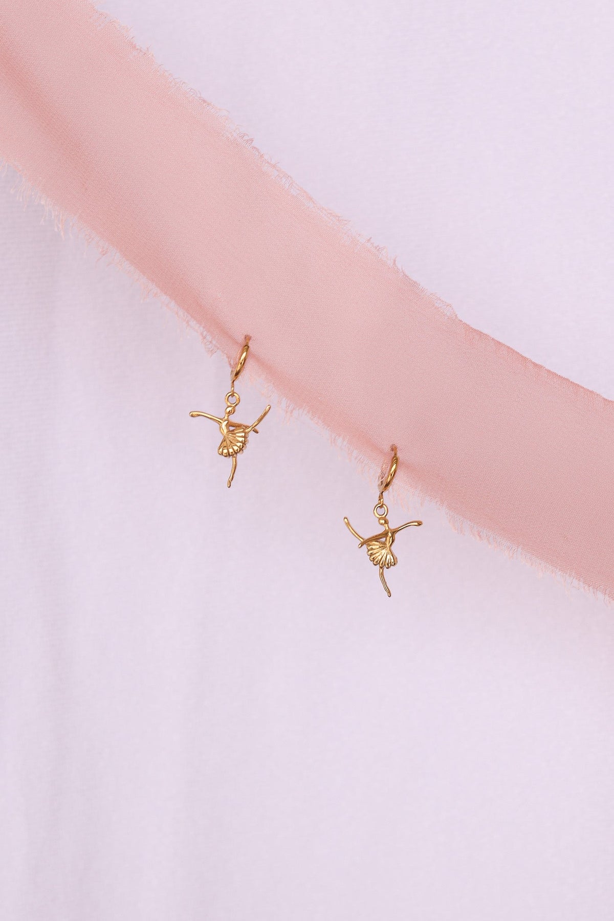 Tiny Dancer Huggie Hoop by Rose & Clay