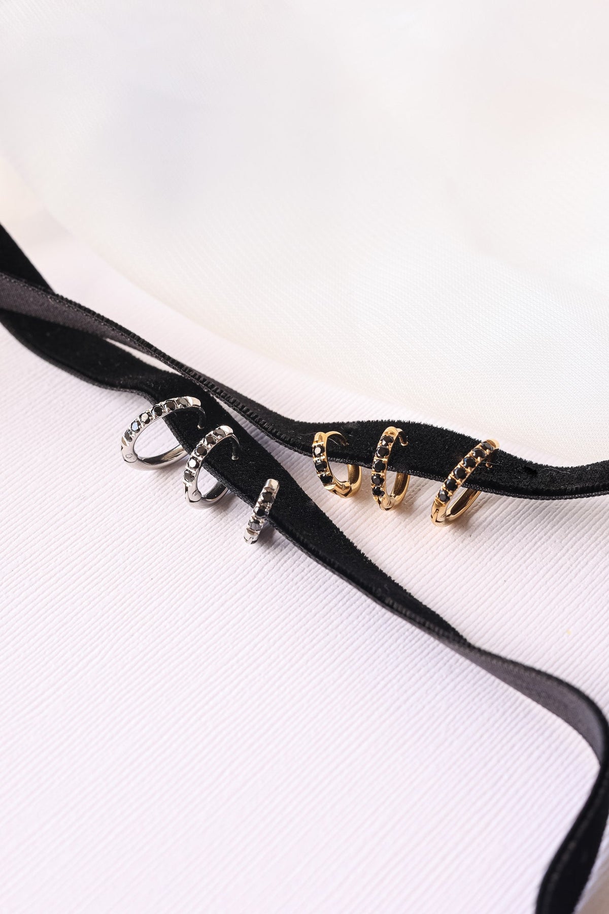 Micro Crystal Hoop in Black by Rose & Clay