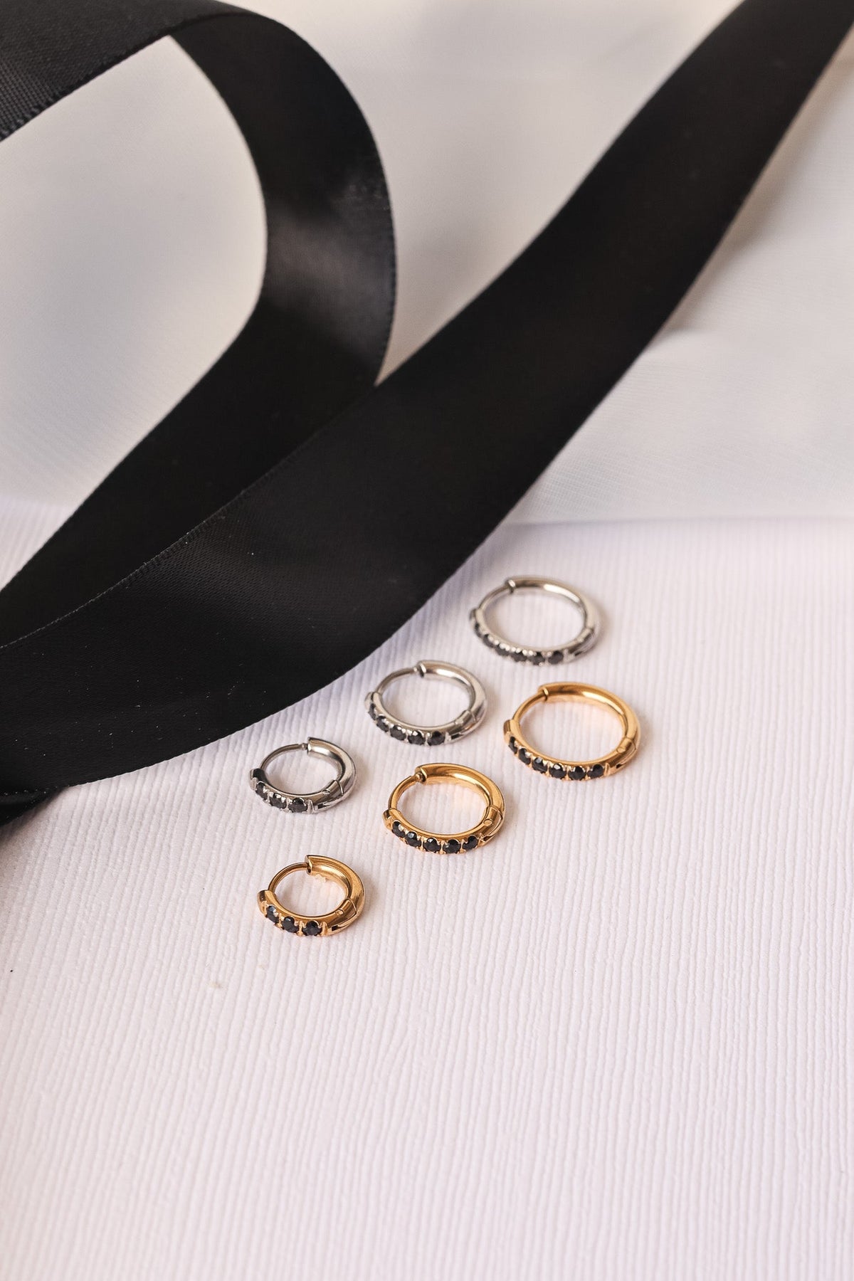 Micro Crystal Hoop in Black by Rose & Clay