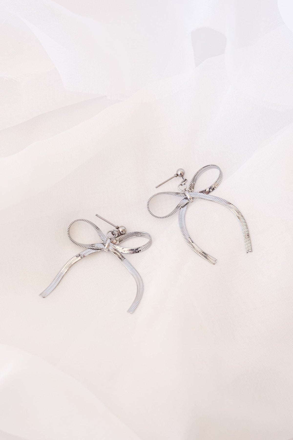 Lauren Bow Dangle by Rose & Clay