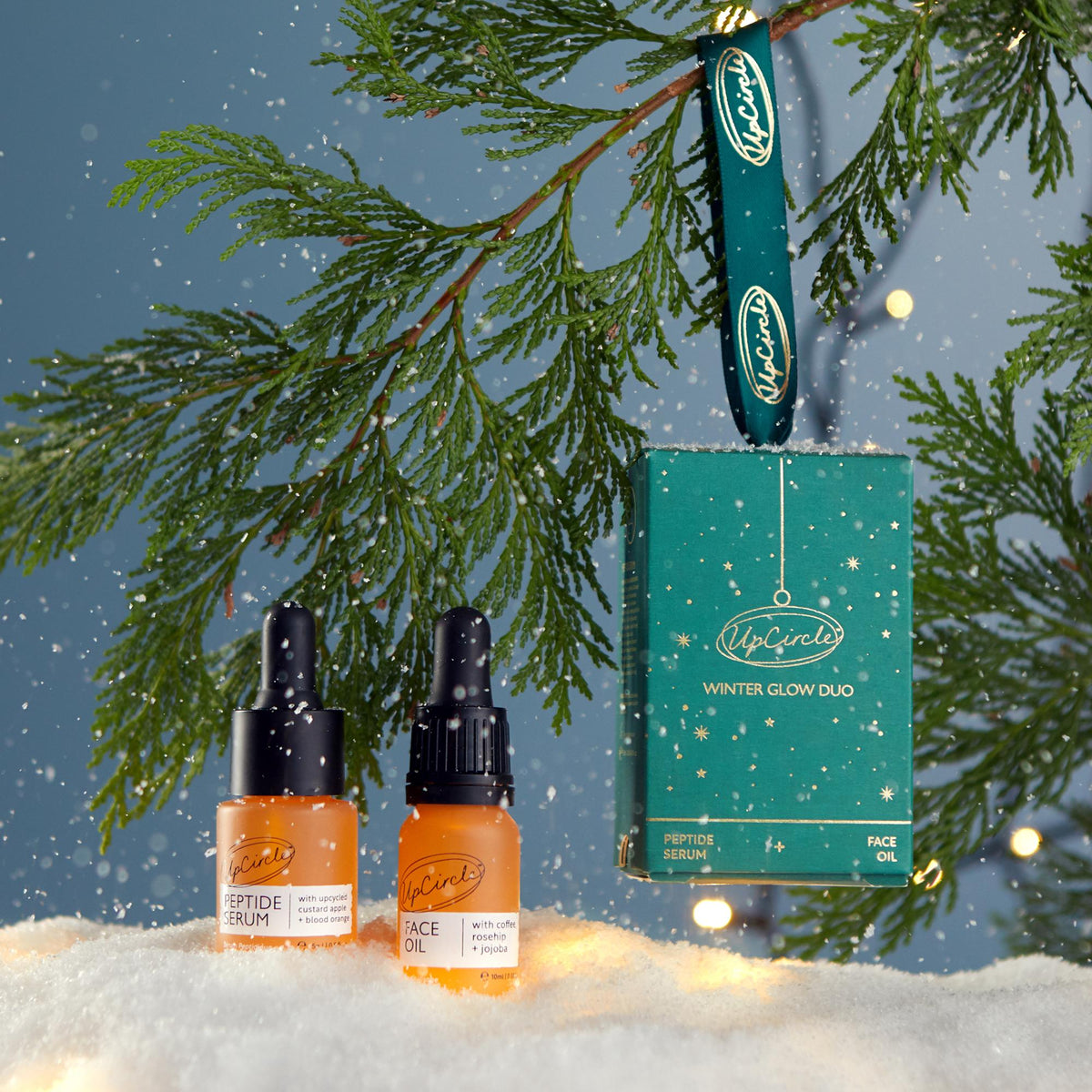 UpCircle Winter Glow bauble with Peptide Serum and Organic Face Oil, lifestyle
