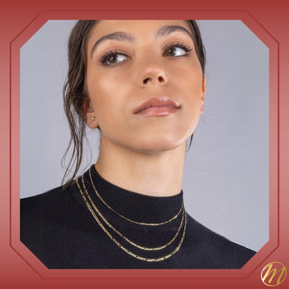 Massete 14k gold Figaro chain, 2mm, worn by a model, view 2