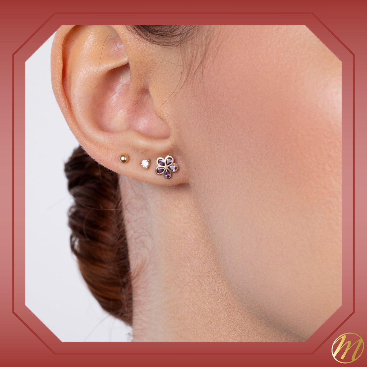 14k yellow gold flower stud earrings worn by a model, Massete, view 2