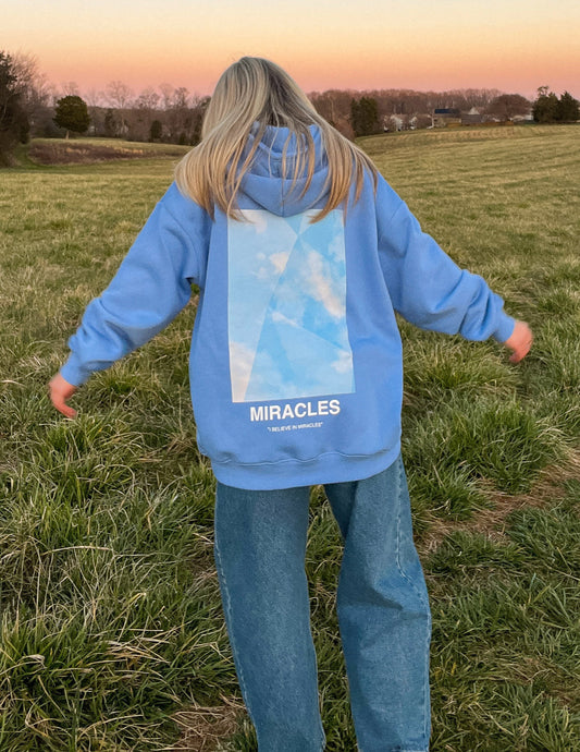 Miracles Blue Unisex Hoodie by Elevated Faith