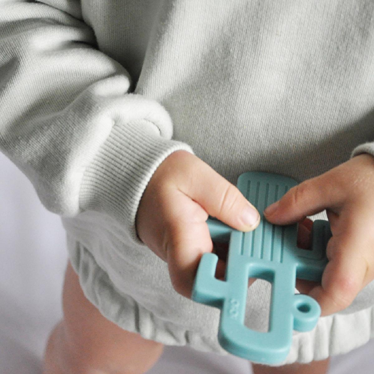 OiOi Baby Teether - Premium Silicone Cactus Teething Relief for Infants - Safe, Durable, and Developmental by Beauty Care Bag