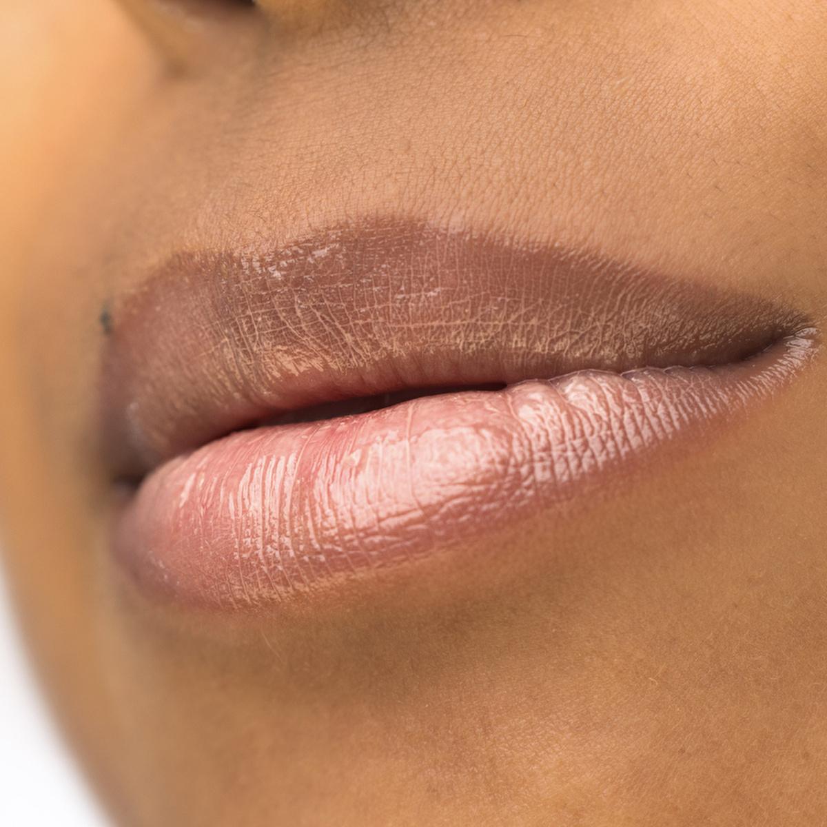 theBalm Instant Plump Your Pucker Lip Gloss: Volumizing, Hydrating, Non-Sticky Formula with Jojoba & Avocado Oil - Howdy Honey Shade by Beauty Care Bag