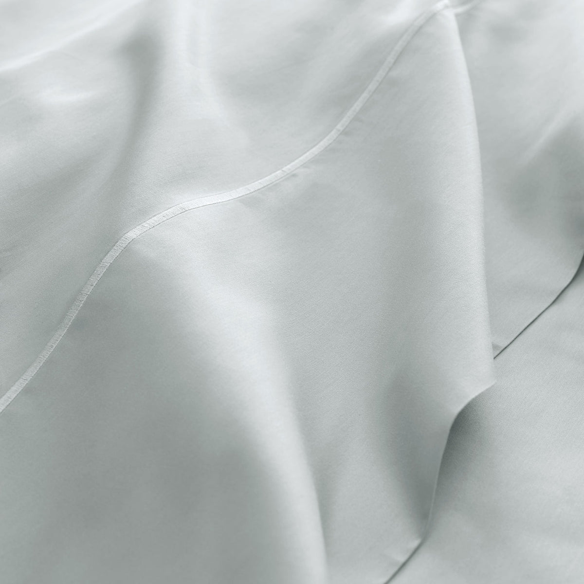 Sateen fabric detail of Whisper Organics 300 TC organic sateen flat sheet in Shore