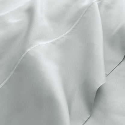 Sateen fabric detail of Whisper Organics 300 TC organic sateen flat sheet in Shore