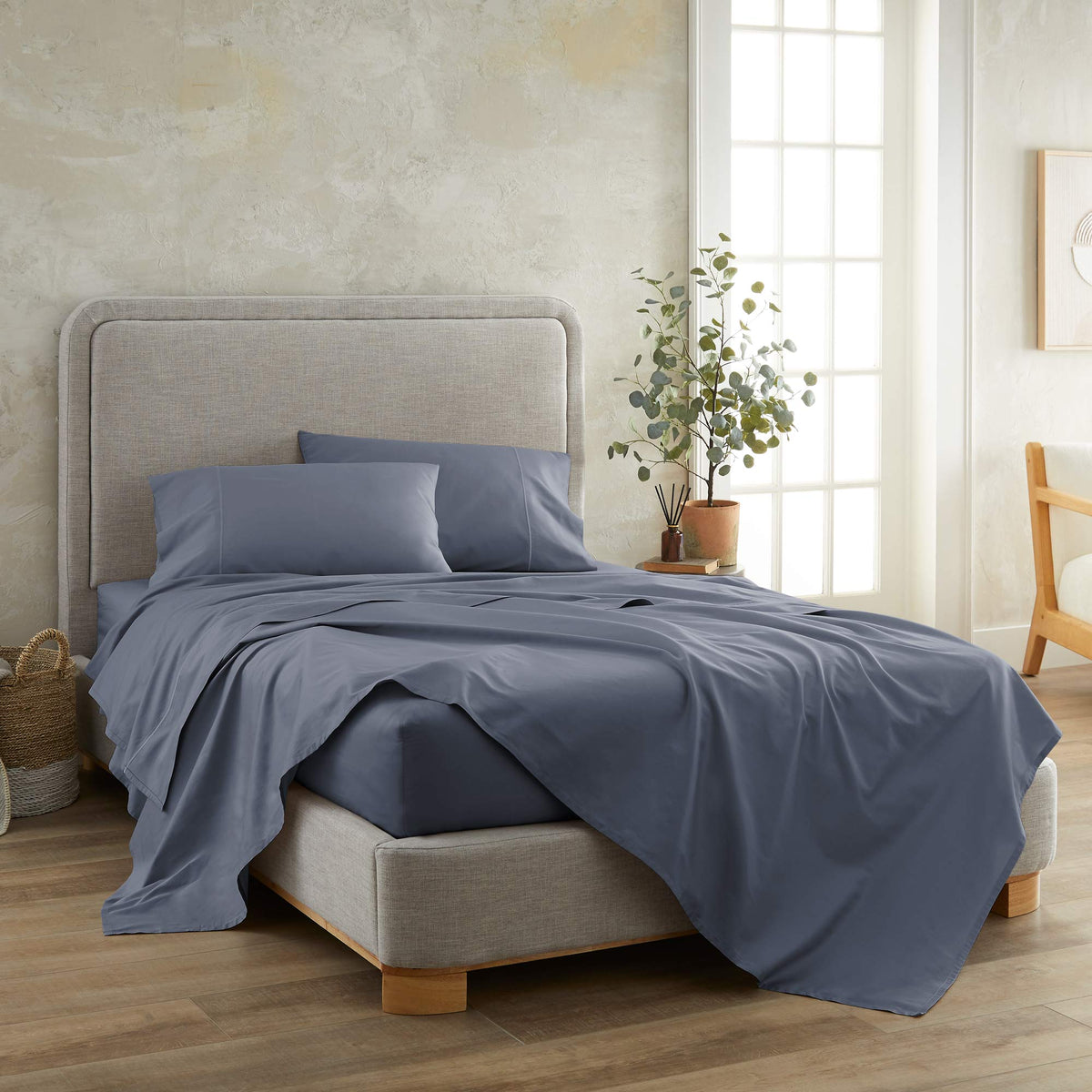 Bed made with Whisper Organics 300 TC organic sateen pillowcase set in Mineral