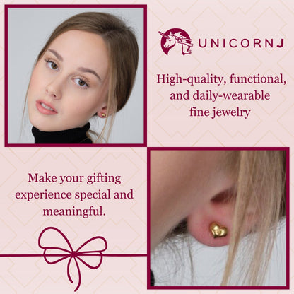 Model wearing 14k yellow gold 6mm puff heart stud earrings by Unicornj, view 2