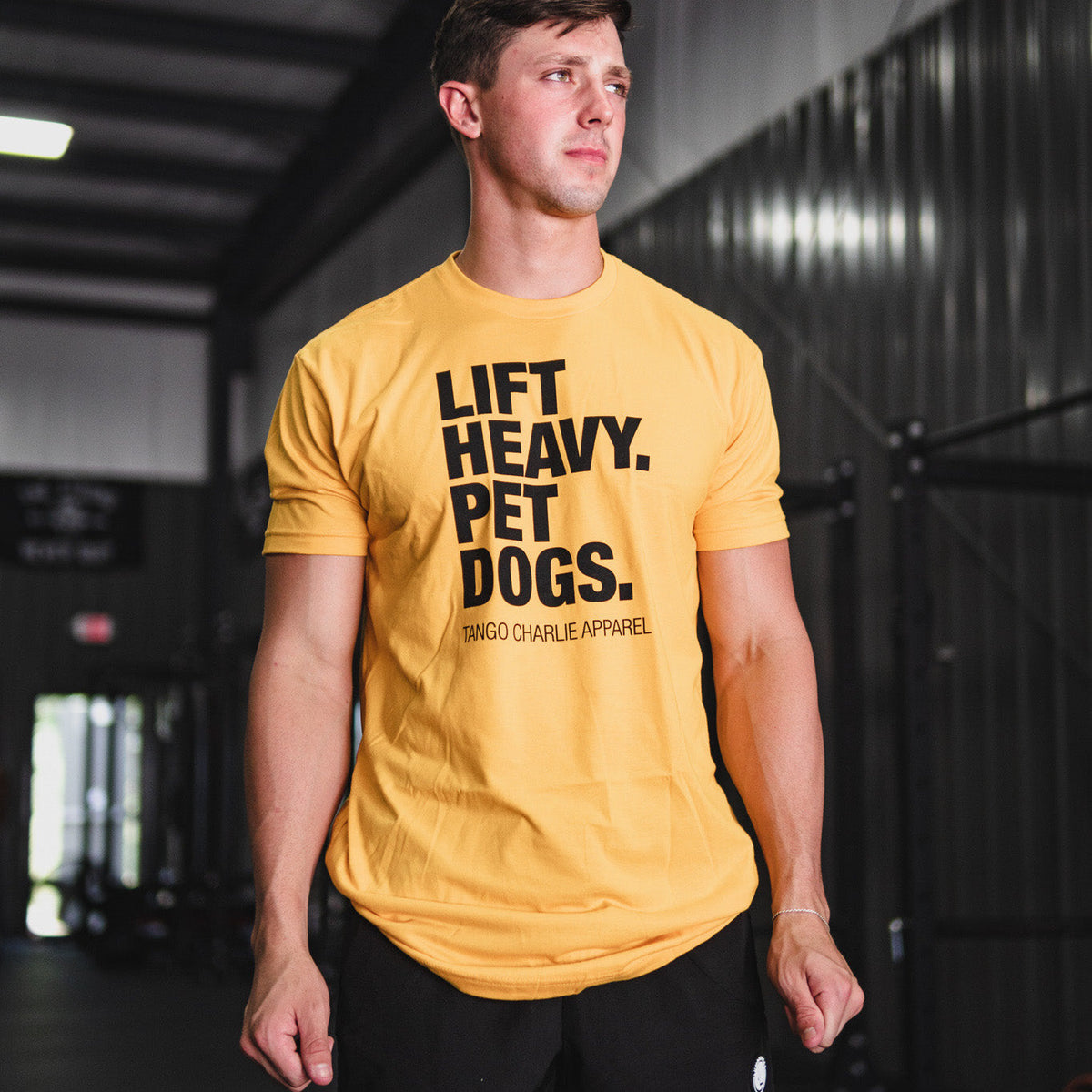 Lift Heavy. Pet Dogs. - Tee by Tango Charlie Apparel