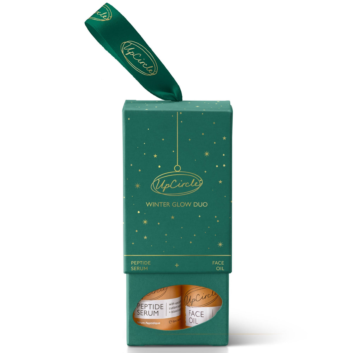 Open UpCircle Winter Glow bauble showing Peptide Serum and Organic Face Oil