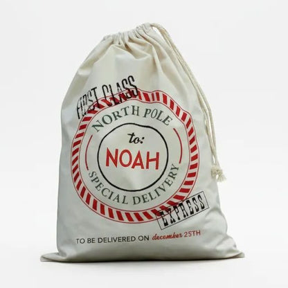 Personalized Santa Sack - Custom Canvas Christmas Gift Bag With Drawstring by Joyful Moose