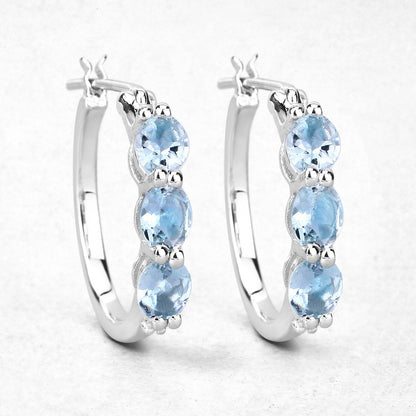 Avera Group 1.75 ct oval aquamarine and white diamond earrings in .925 sterling silver