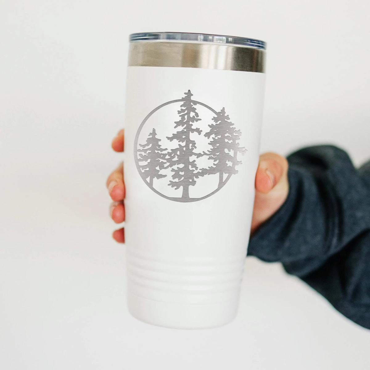 20 oz insulated hiking tumbler with laser-engraved pine tree design by Joyful Moose