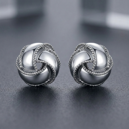 Textured and Polished Love Knot Earrings in Sterling Silver by Avera Group