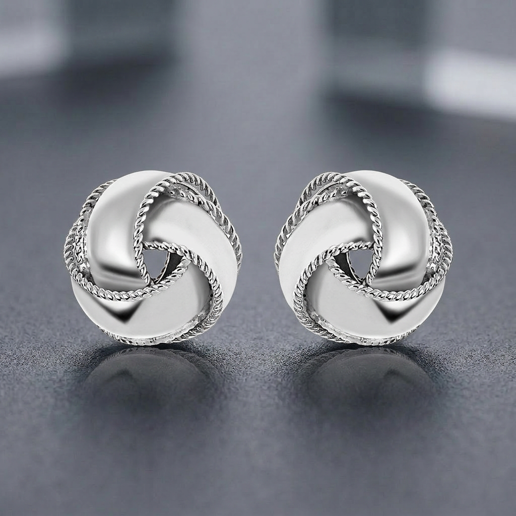 Textured and Polished Love Knot Earrings in Sterling Silver by Avera Group