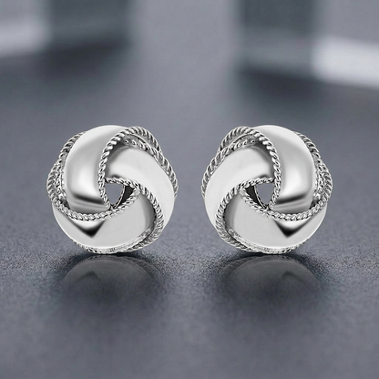 Textured and Polished Love Knot Earrings in Sterling Silver by Avera Group