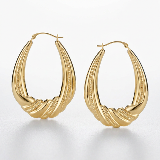 14k yellow gold graduated textured oval hoop earrings by Avera Group, view 2