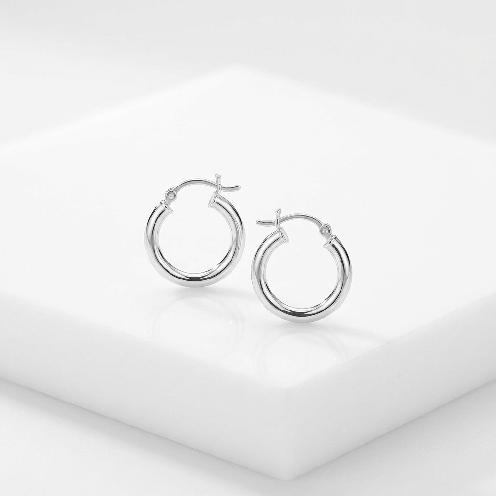 Sterling Silver Polished Hoop Style Earrings with Rhodium Plating (15mm) by Avera Group