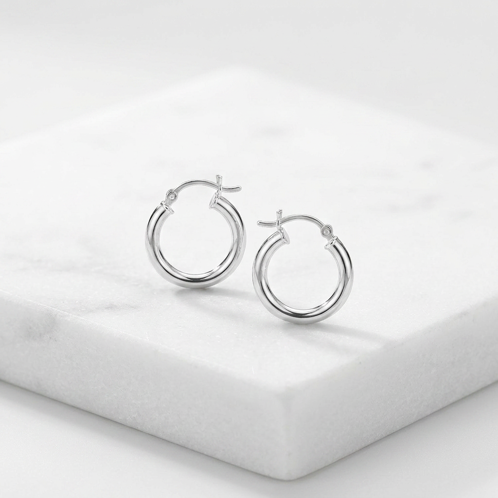 Sterling Silver Polished Hoop Style Earrings with Rhodium Plating (15mm) by Avera Group