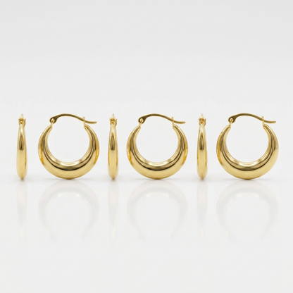 14k yellow gold graduated round shape hoop earrings by Avera Group, view 4