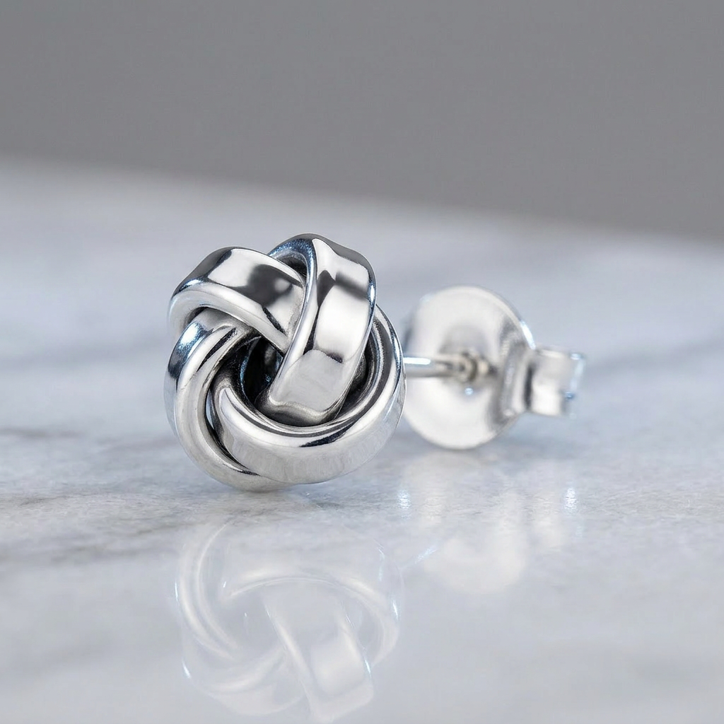 Petite Sterling Silver Polished Love Knot Earrings by Avera Group