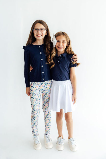 Navy S/S Ruffle PoloS/S Ruffle PoloTorqelo.com