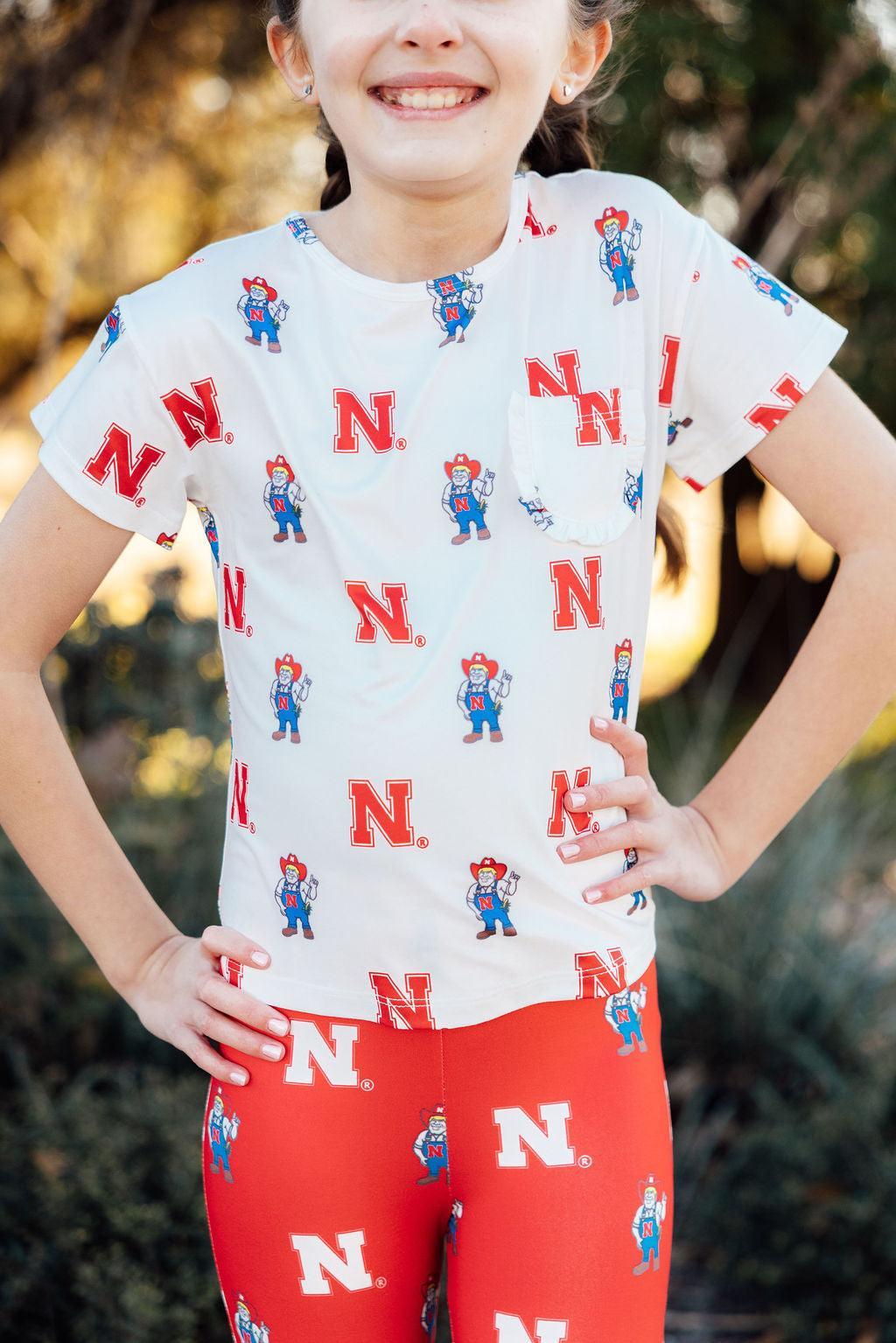 Nebraska White Herbie Husker Ruffle Pocket TeeRuffle Pocket TeeTorqelo.com