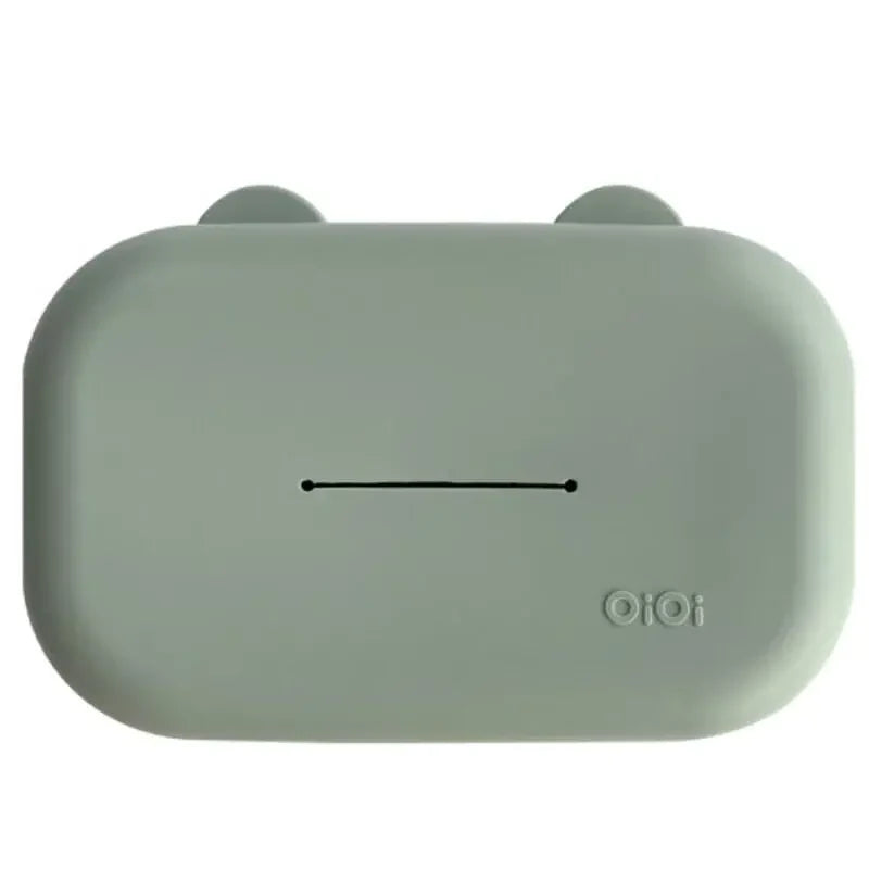 OiOi Silicone Wipe Cover in River Green for Easy Dispensing by Beauty Care Bag