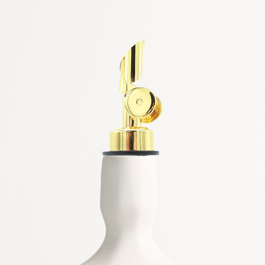 Self-closing gold pour spout for olive oil and spirit bottles