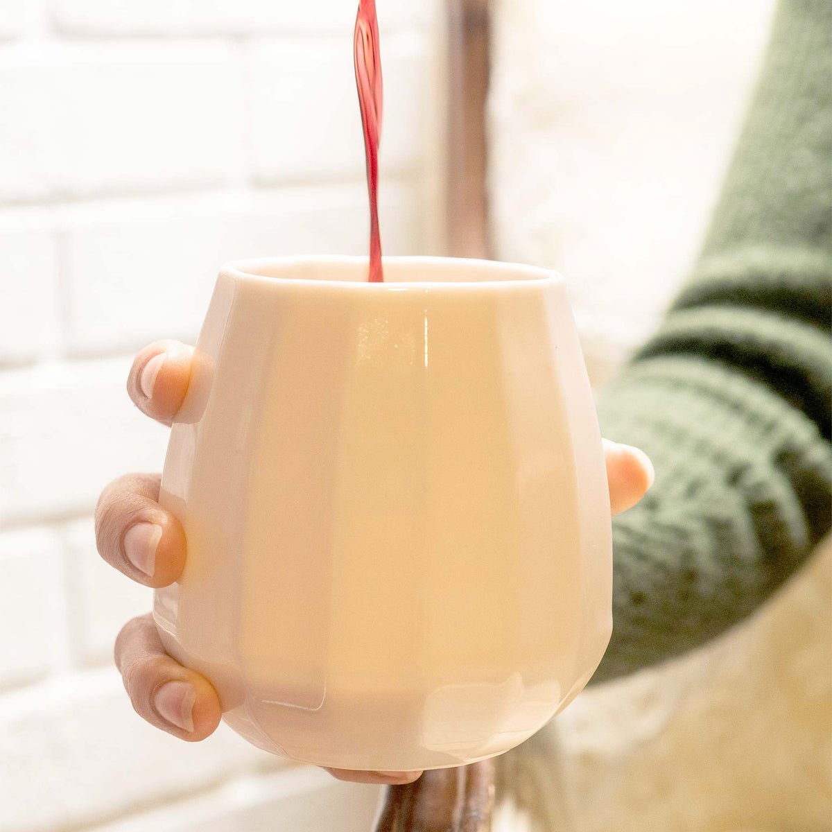 Handmade translucent porcelain wine glass with a modern design